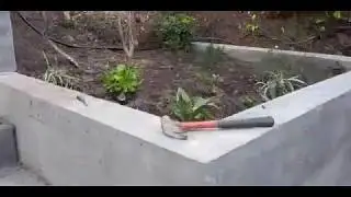 Veterans concrete,.....landscape by Nicole Kelly progress @ ret. wall system/deck/BBQ