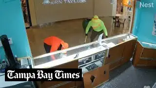 Watch: Robbers use sledgehammer to break open jewelry cases at WestShore Plaza mall