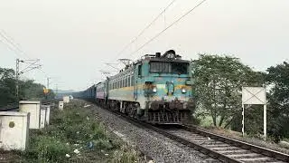 Dual Wag7 powered Goods Train crossing with Wap7 powered Passenger Train/Train Videos/Travel/Wag9hc 