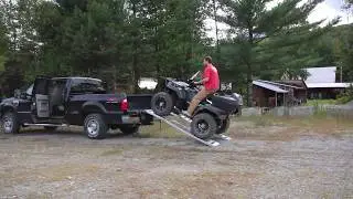 Loading a Polaris Sportsman 850 ATV into a Ford F250 Pickup Truck with Reese Ramps