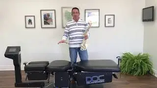 Burlington Chiropractor demonstrates how their decompression tables can help SCOLIOSIS!