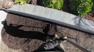 Spreading soil for the grass