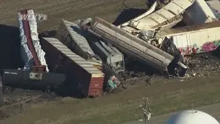 Train derails in Kentucky sparking fire and leak of substance