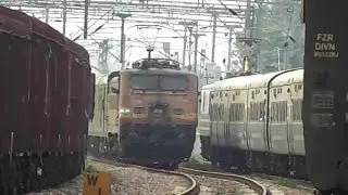 Flag exchange!!  GZB WAP1 22058 with 12017 crossing 12056 hauled by 30118 GZB WAP5