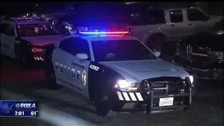 Woman robbed, man shot by masked men