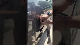 Remove gorilla tape from a car door without damaging the paint.