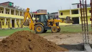 Jcb Working In a Building Construction Site