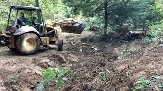 Land Clearing With A Backhoe