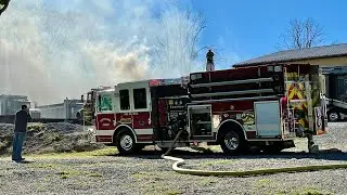 Crews battle 2-alarm fire at automotive garage in Robeson Township