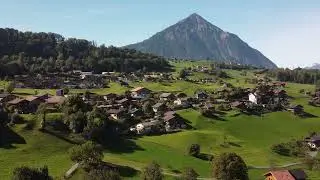 Drone View of a Village near Mountain | Free Footage - Videos for content creators