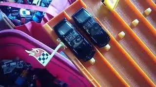 Racing both versions of K.I.T.T. (Knight Industries 2000) down my 6 lane speedway.
