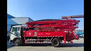 What is a truck-mounted concrete boom pump?