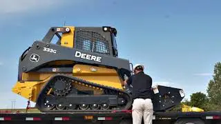 How To | Loading and Unloading a Compact Track Loader onto Trailer  | John Deere
