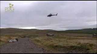 Aerial Crane - Lifting cement for hill top radio mast foundations