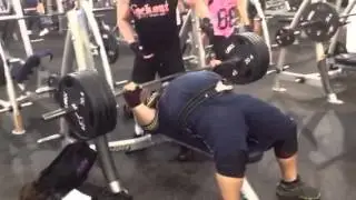 Mike Womack bench presses 405lbs. For 45 reps