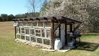 Making a large greenhouse from recycled material.