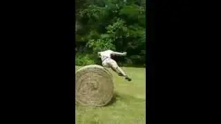 Jumping over hay bale