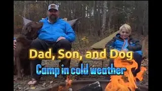 Daddy, son, and dog camp in near freezing temps!