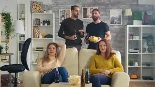 Friends Watching TV Stock Video
