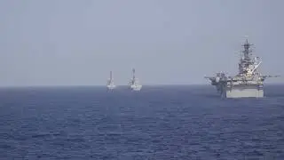 USS Dewey conducts operations alongside USS Higgins, USS Howard, USS Ralph Johnson, and JS Kongo