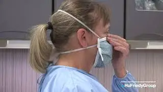 Donning Instructions for the Crosstex Isolator Plus N95 Surgical Respirator