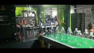 Fully Automatic 2-Cavity PET Bottle Blow Molding Machine in Action | Production Video