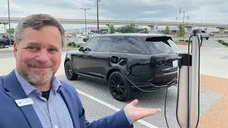 2023 Gas / Electric Hybrid Range Rover in Santorini Black with the Garnet Red Interior