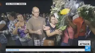Attack in Nice: residents form chain to move flowers and momentos along promenade