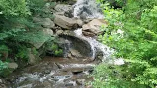 Back mountain trail waterfall in june