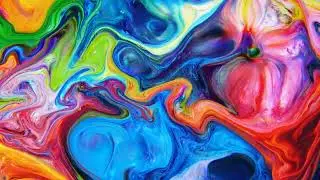 colorful liquid paint swirling together in slow motion