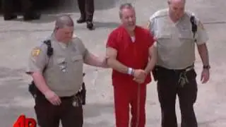 Raw Video: Handcuffed Peterson Cracks Jokes