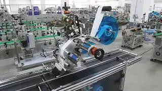 NY 829 top and bottom labeler, labeling machine, flat surface top label applicator