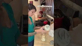 Transferring sourdough into a clean jar