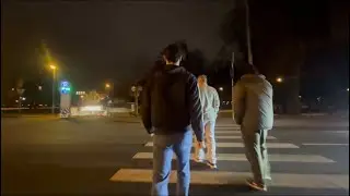 Men walk through Riga 