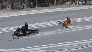 Epic day on skis and snowmobiles 