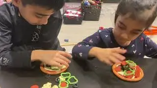 Pizza Mania game match between brother and sister and teaches how to count.