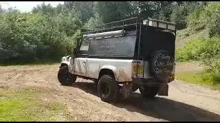 Driving land rover defender through a lake 110 deep water