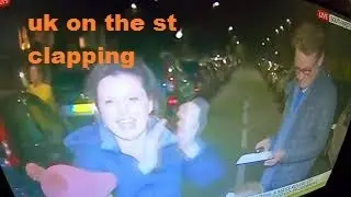UK London people on the street clapping and cheering the NHS hero's