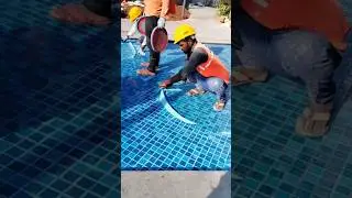 Applying Mosaic tiles in swimming pool #shorts #civil #construction #engineering #youtubeshorts