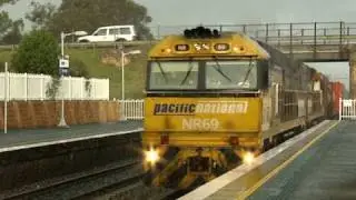 Pacific National freight train passes through Thornton station.