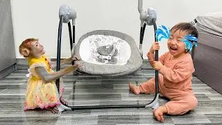 Monkey Kaka and Diem fight over the baby's crib.