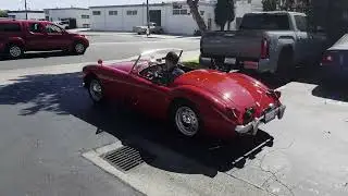 1959 MGA 1500 ROADSTER. ORIENT RED WITH BLACK TRIM, TOP, AND TONNEAU COVER. 5-SPEED, DISC WHEELS.