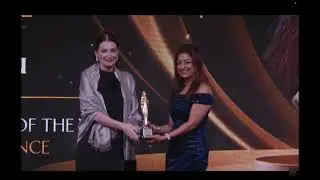 Monu being awarded Business Leader of the Year at Forttuna Global Excellence Awards in Dubai