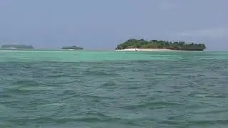 approaching Chapwani island (also known as Grave island) by boat