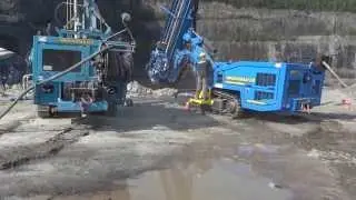 Drilling Supply Blast Hole Drill Rig in operation.