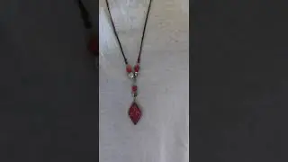 Video collana con corallo semi prezioso