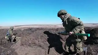 Russian Soldiers Firing 120 mm Sani Mortars, RPG 7V Grenade Launchers, And AK 74 Assault Rifles