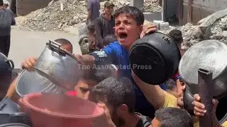 Desperate families scramble for food in across embattled territory