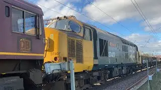 Class 66108 and 37407 pull the track sleepers