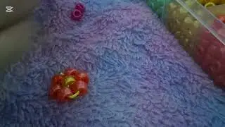 Tutorial on how to make an kandi flower bracelet and an kandi flower charm